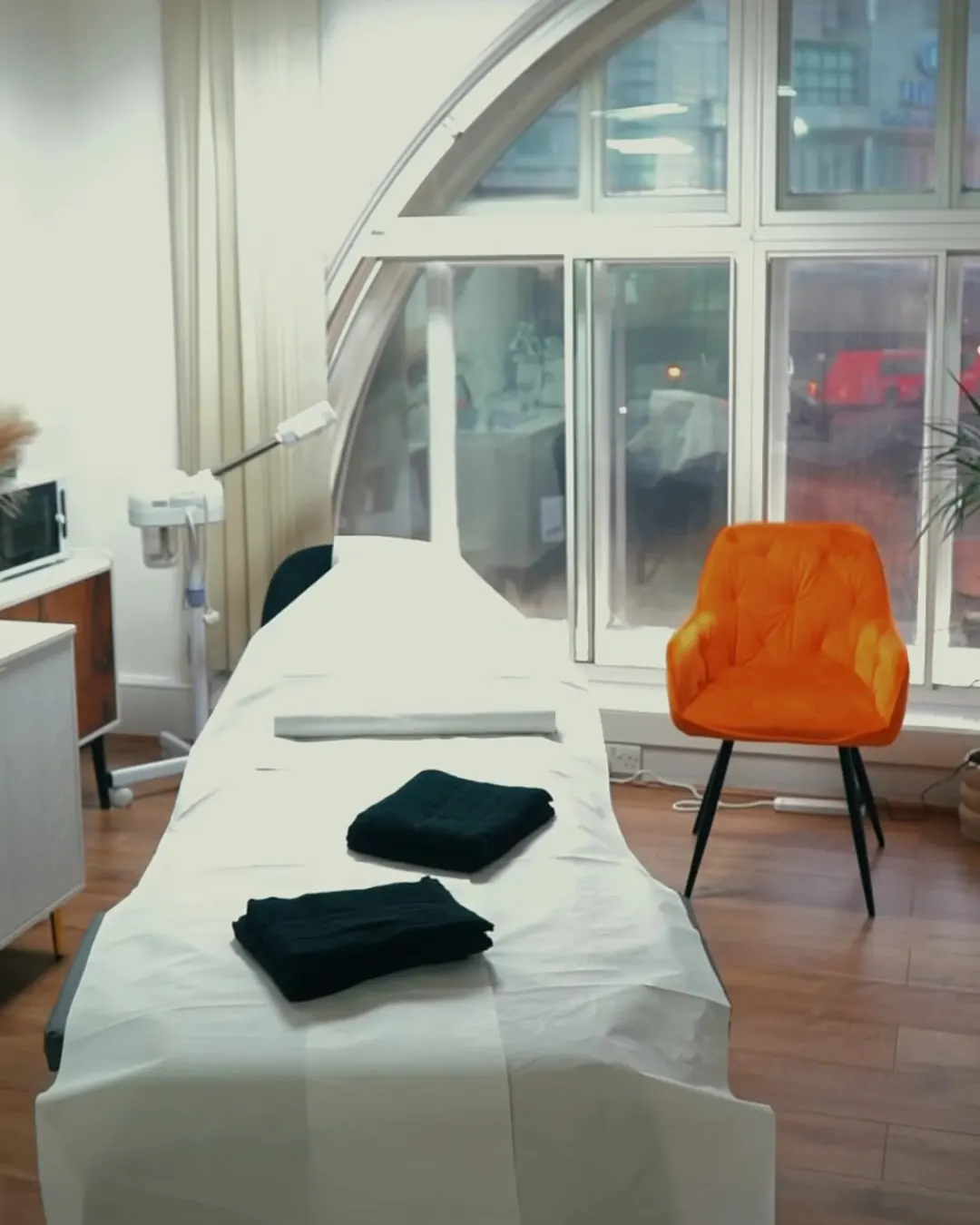 Treatment room with an arched window at ZARA Aesthetic Medical Clinic, Edgware Road