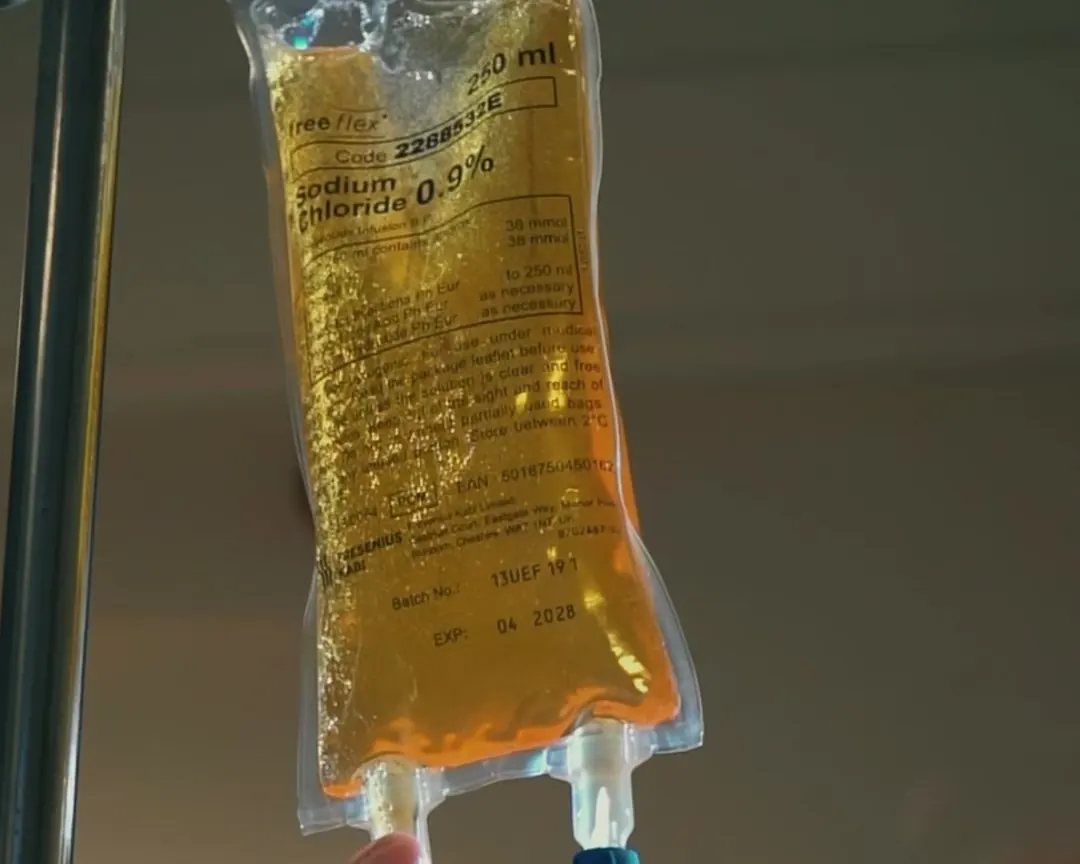 An IV drip bag being prepared