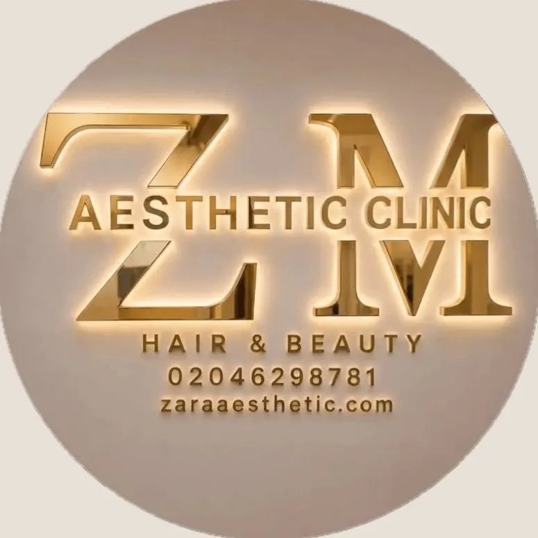 The backlit gold ZM Aesthetic Clinic sign at 304 Edgware Road